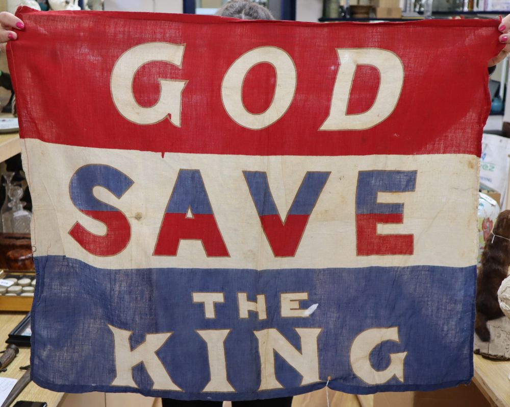 A George V commemorative flag God save the King